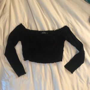 Off the shoulder black shirt